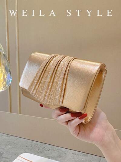 Bolso dorado tipo sobre