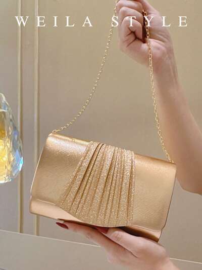 Bolso dorado tipo sobre