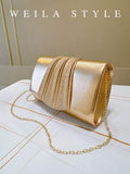 Bolso dorado tipo sobre
