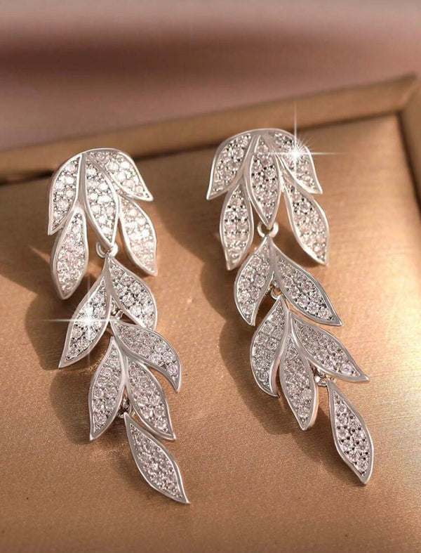 Aretes dorados hojas