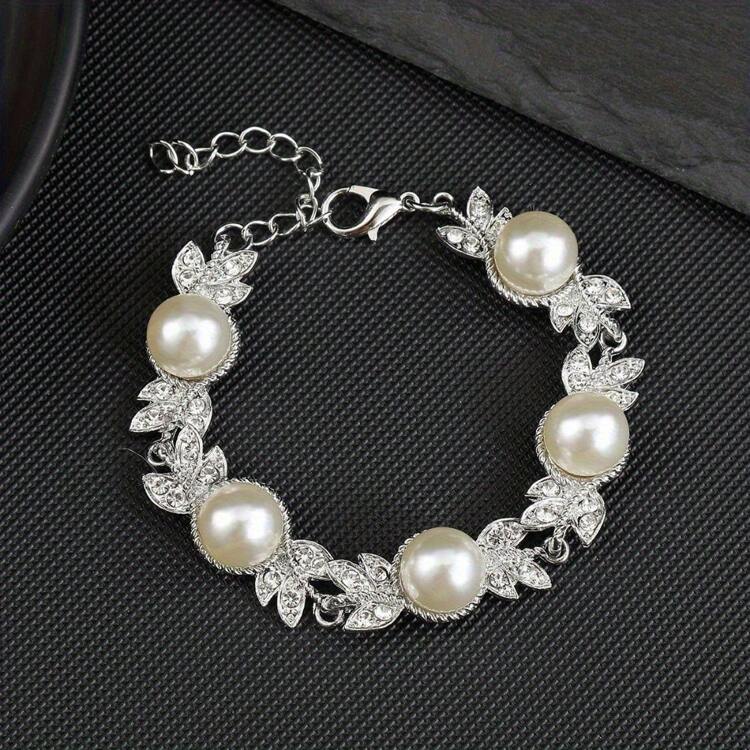 Set de joyeria 3pz perla + hojas