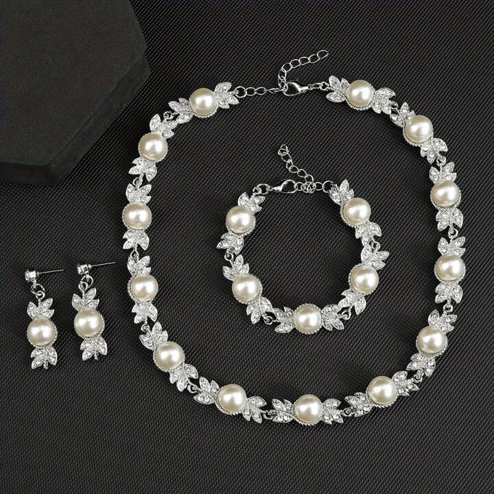 Set de joyeria 3pz perla + hojas