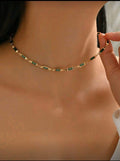 Gargantilla dorado con verde