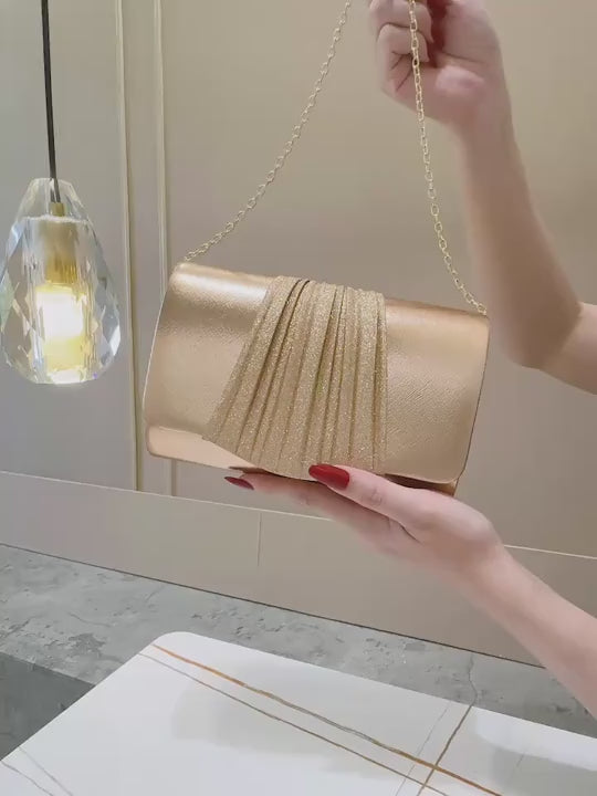 Bolso dorado tipo sobre